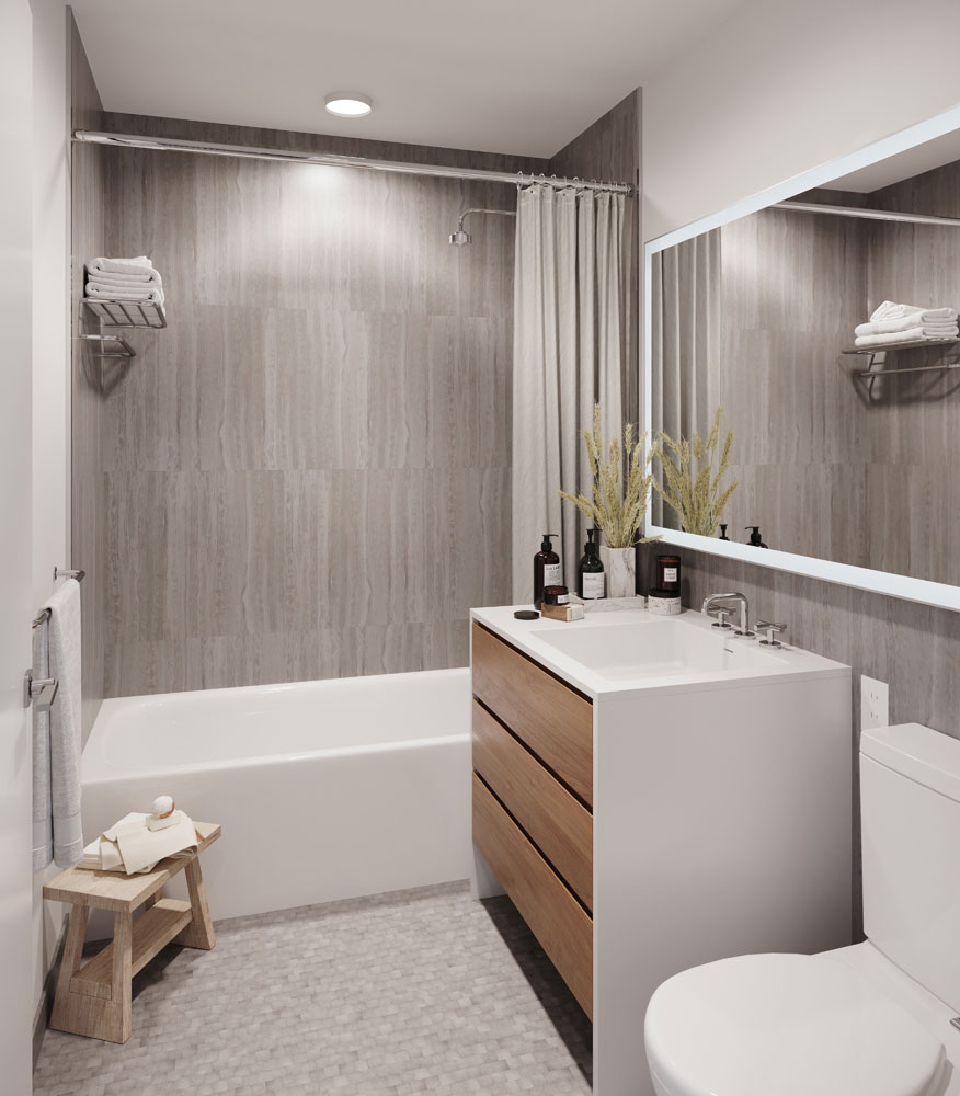 200 W. 60 rental apartment bathroom equipped with marble tile wall and floor, double-height medicine cabinets, and LED Illuminated Mirrors.